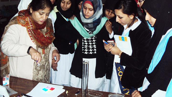 Imrana Ashraf (far left) inspiring young women in Pakistan with optics workshops