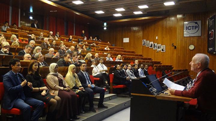 ICTP scientist Luciano Bertocchi addresses MMP graduates and audience at the first MMP graduation ceremony