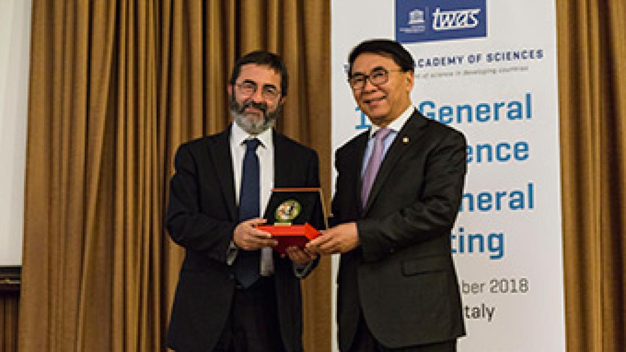 Top Recognition for ICTP Director