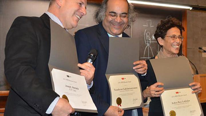 Joseph Niemela, Vasudeva Lakshminarayanan and Zohra Ben Lakhdar showing the 2011 SPIE Educator Award certificates, which were awarded during ICTP's Winter College on optics in imaging science in February 2011.