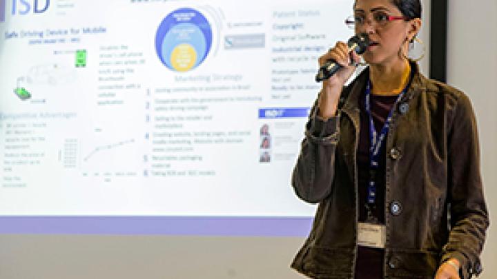 Participant making a business pitch during final day of ICTP's Entrepreneurial workshop