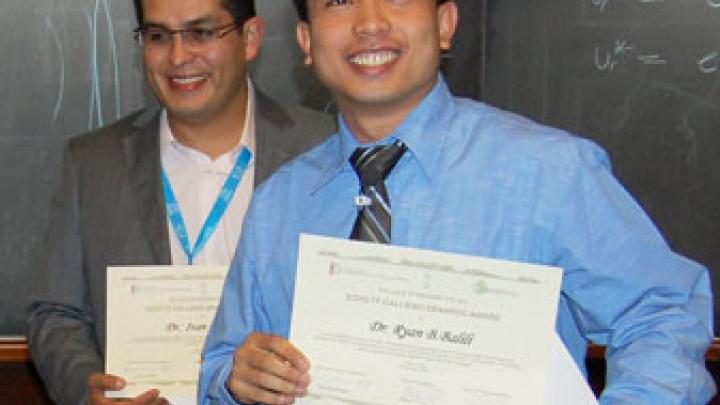 ICO/ICTP award winners Ivan Moreno (left) and Ryan Barrido Balili