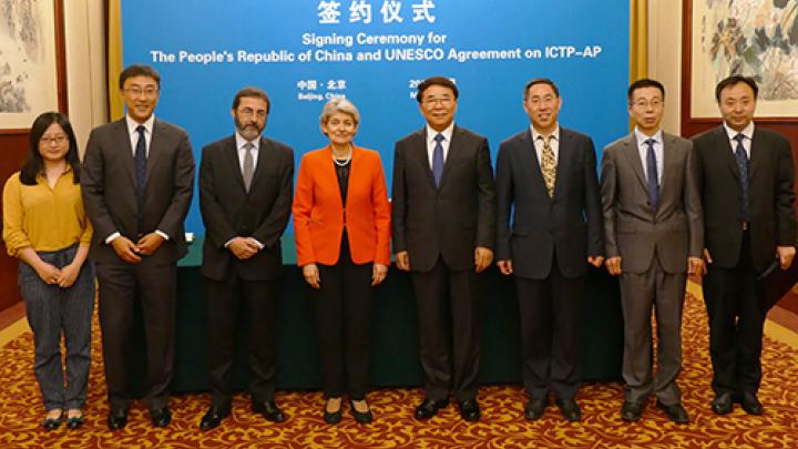 ICTP Director Fernando Quevedo (third from left) with UNESCO Director-General Irina Bokova (center) and Chinese Academy of Sciences President Chun-Li Bai (center) at signing of agreement to establish ICTP-AP