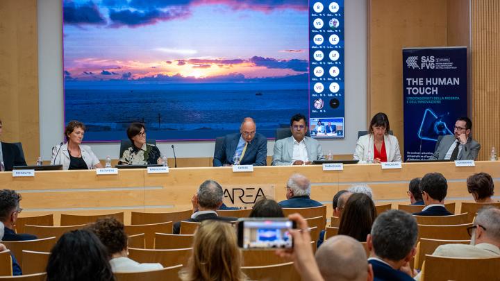 People participating in a panel discussion