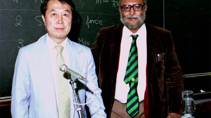 Yoichiro Nambu poses with ICTP founder Abdus Salam at the 1986 Dirac Medal ceremony