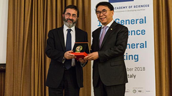 Top Recognition for ICTP Director